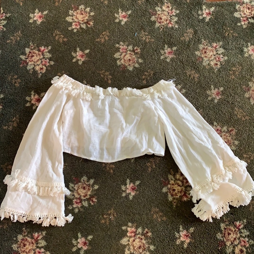 showpo cropped off the shoulder boho-tassel shirt